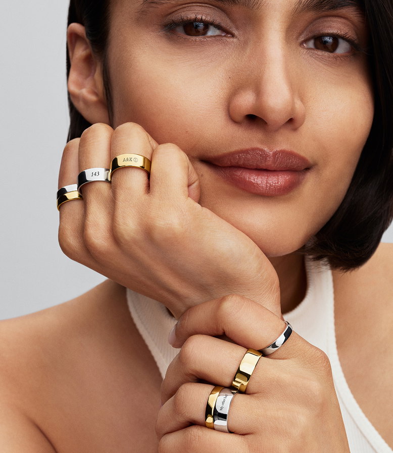 Model wears Pandora engravable rings