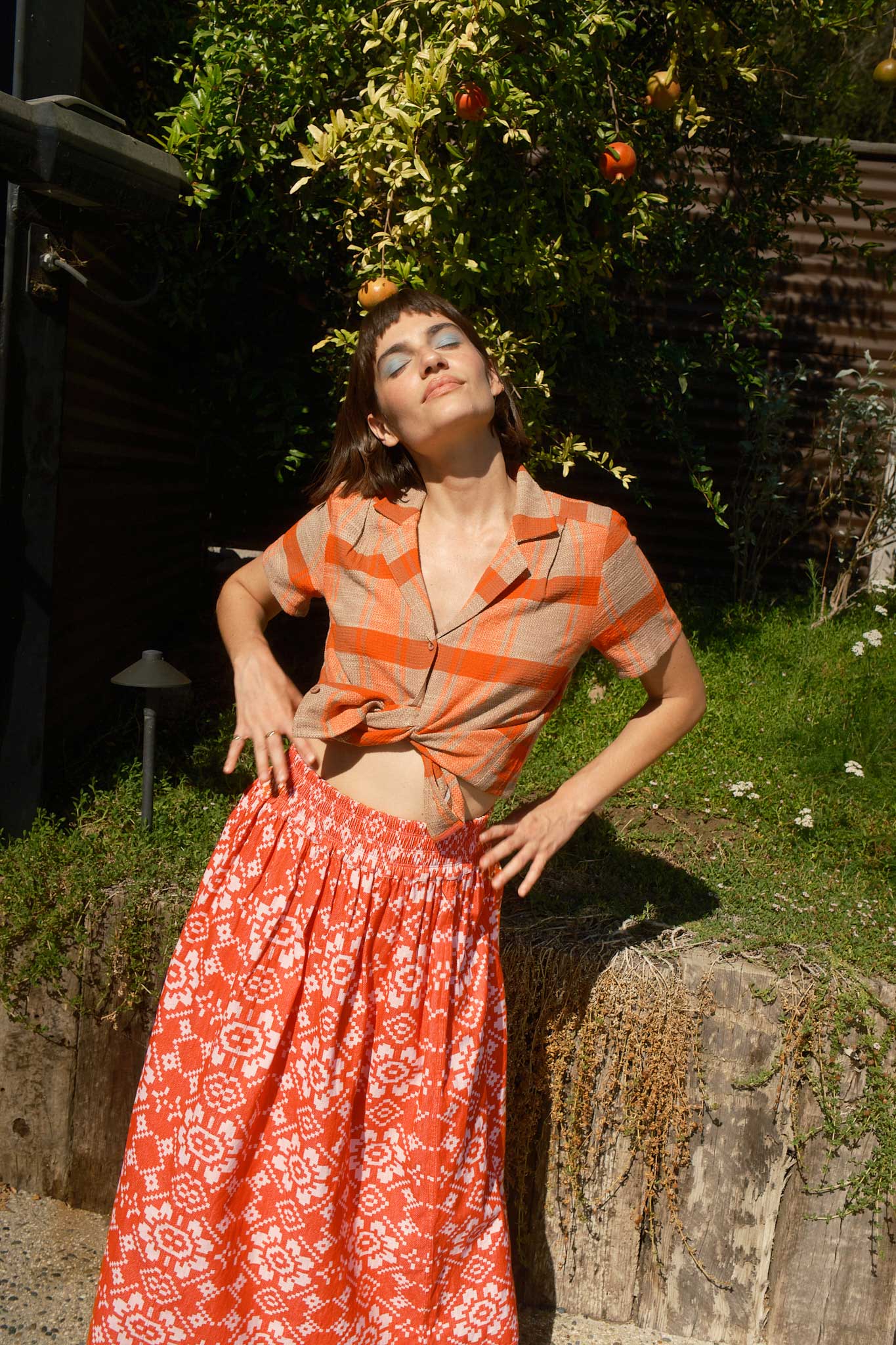 model in tasi top lipstick and rara midi love