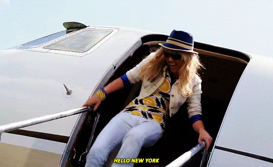 Hannah Montana saying, "Hello new york" after stepping off of an airplane.