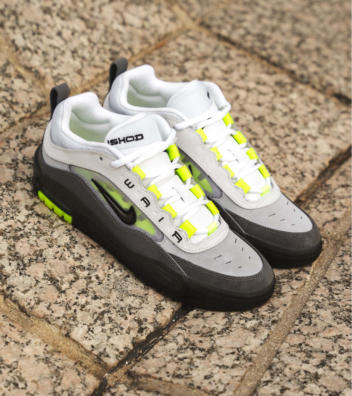 Shop sale Nike, like the Air Max Ishods in white and tennis-ball yellow.