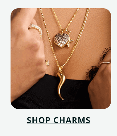 Gold charm necklaces with heart & Italian horn pendants. Click here to shop charms