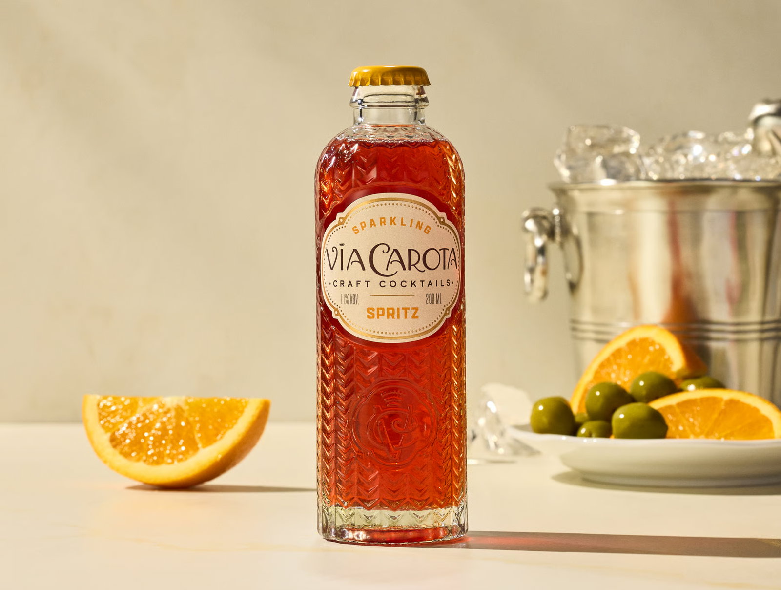 Via Carota Craft Cocktails Spritz served over ice with orange and olives