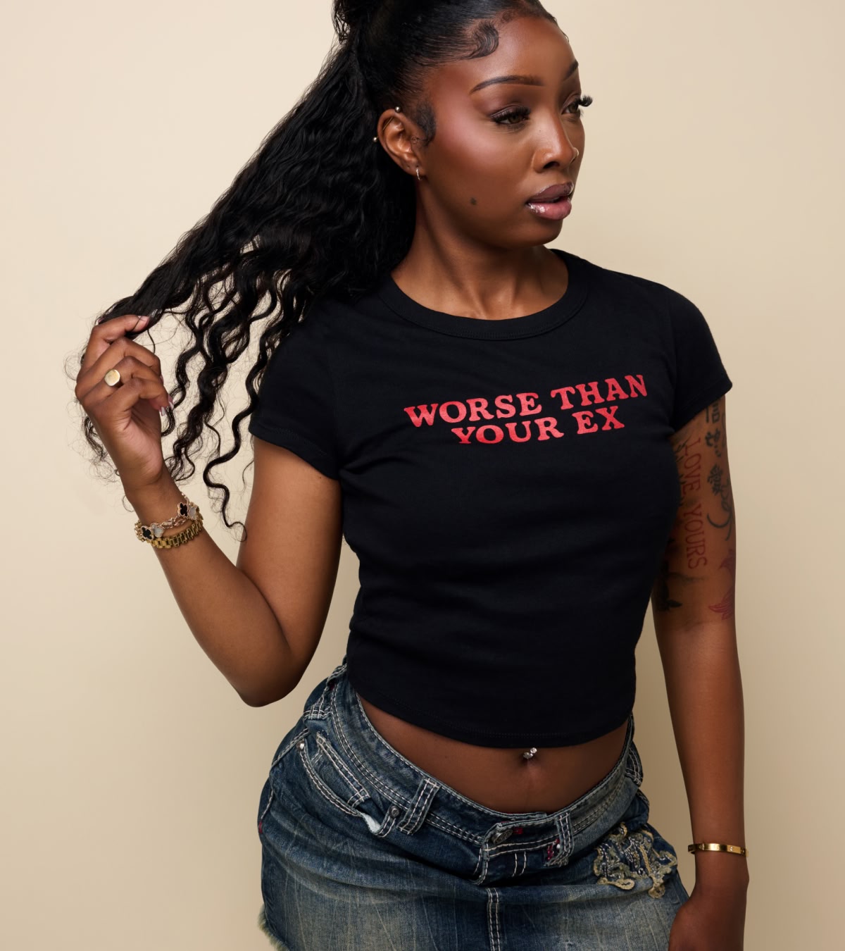 Shop women's tees, including baby tees with iconic sayings from Ninth Hall