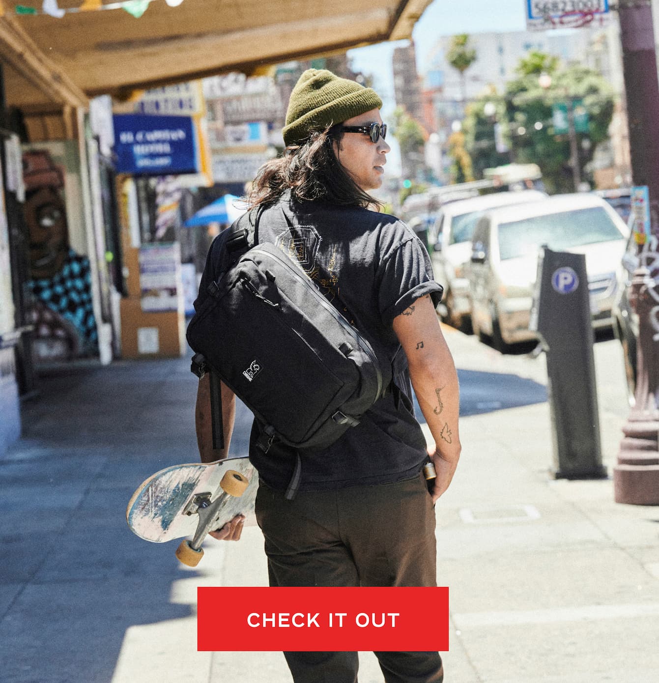 The Kadet Max 15L Sling on a guy walking around SF
