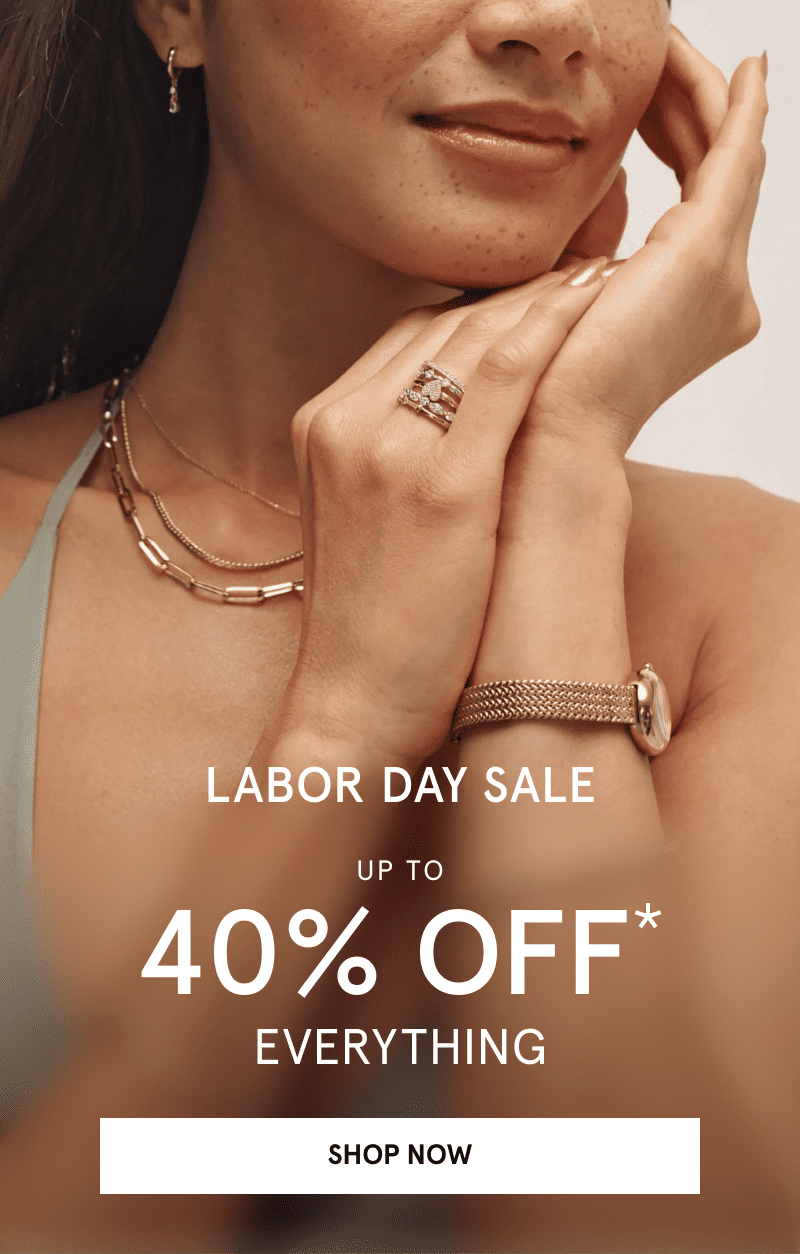 A model wearing layered gold jewelry. Labor Day sale. Up to 40% off everything. Click shop now.