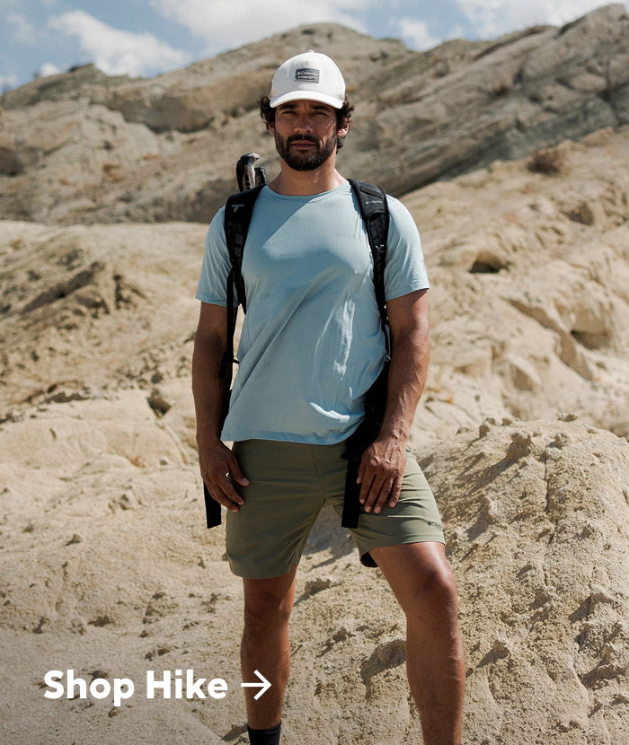 Man in a desert setting. Shop Hike