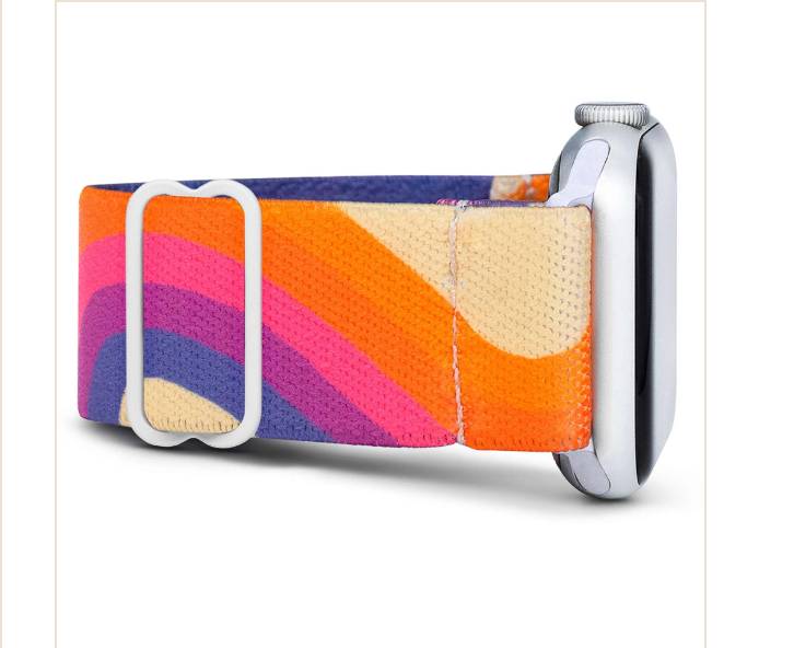 Close-up of a Sunset Stripe Apple Watch band on an Apple Watch.