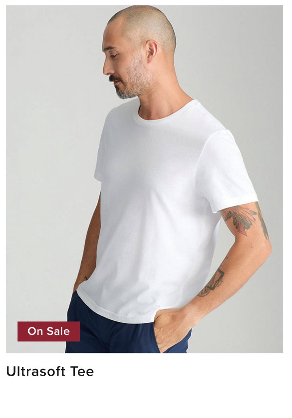 Model is wearing UNTUCKiit ultra soft tee in white. 