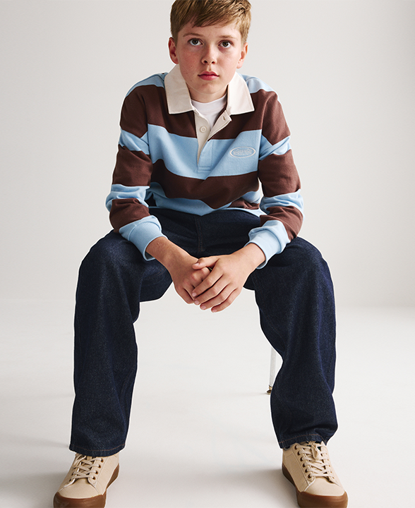 Boy wearing Pure Cotton Barrel Leg Jeans in Dark Denim