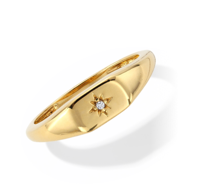 Yellow gold signet ring with an engraved star and diamond in the centre.