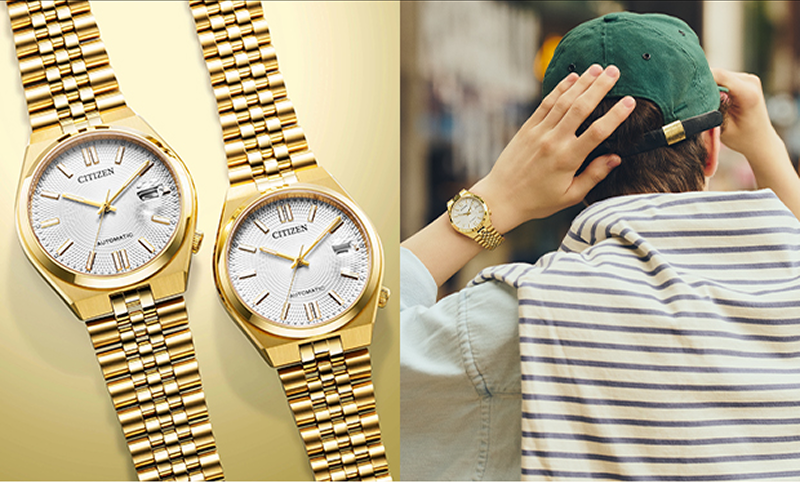 Two gold-tone Citizen automatic watches beside a model wearing one.