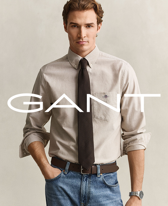 Man wearing a GANT Light Taupe Pure Cotton Classic Oxford Shirt