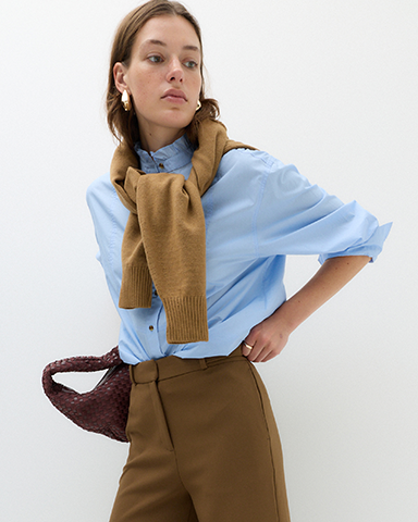 Woman wearing a Blue Shirt and Moss Tailored Side Tab Wide Leg Trousers