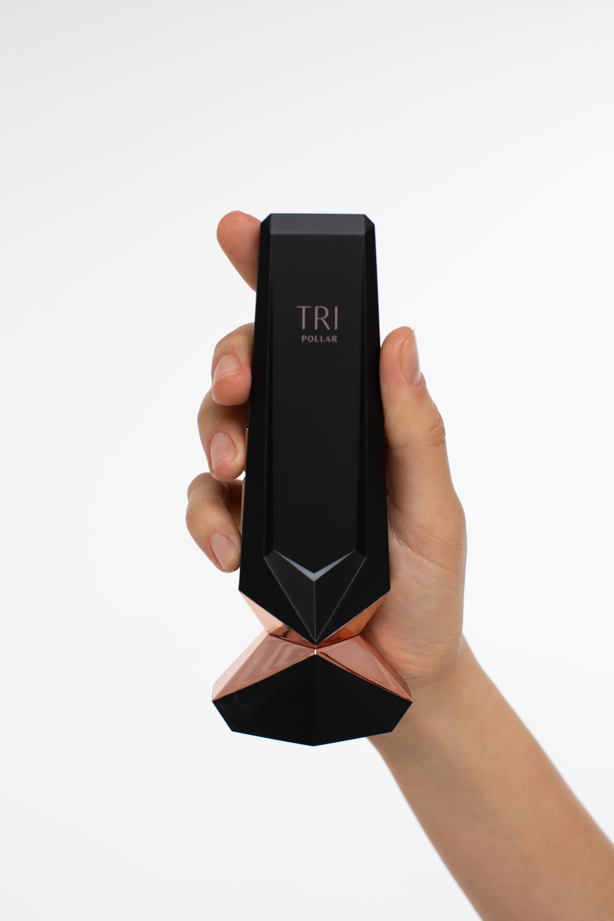 The TriPollar STOP Vx 2 device in black and rose gold