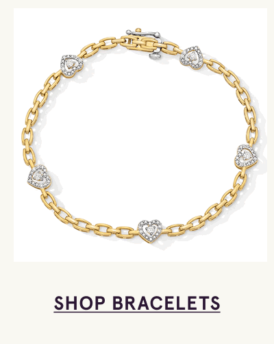 Gold chain link with diamond-encrusted silver heart stations. Click here to shop bracelets
