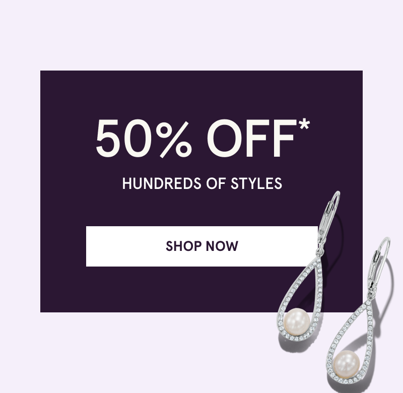 Silver teardrop drop earrings set with diamonds & a pearl. 30-50% OFF Select Jewelry. Click here to shop now