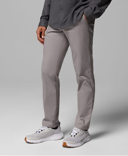 A man wearing light gray pants