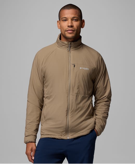 A man wearing a light brown jacket