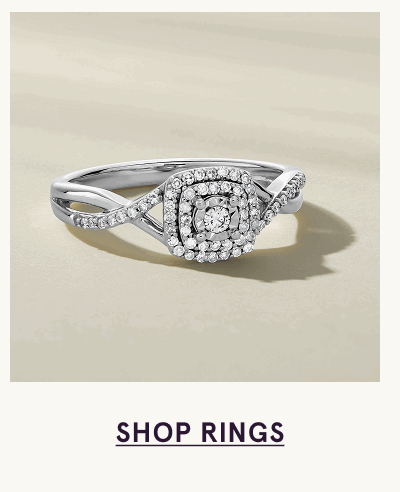 White gold cushion-cut double halo diamond ring. Click here to shop rings