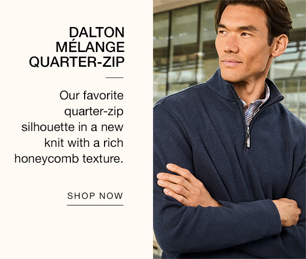 Model wearing a navy Dalton Mélange Quarter-Zip over a patterned shirt. Text reads: 