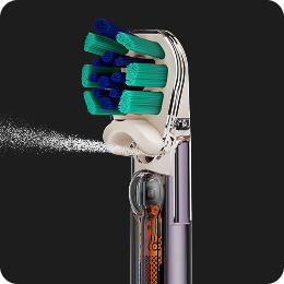 Dyson CameraJet toothbrush sprays a jet of mouth rinse.