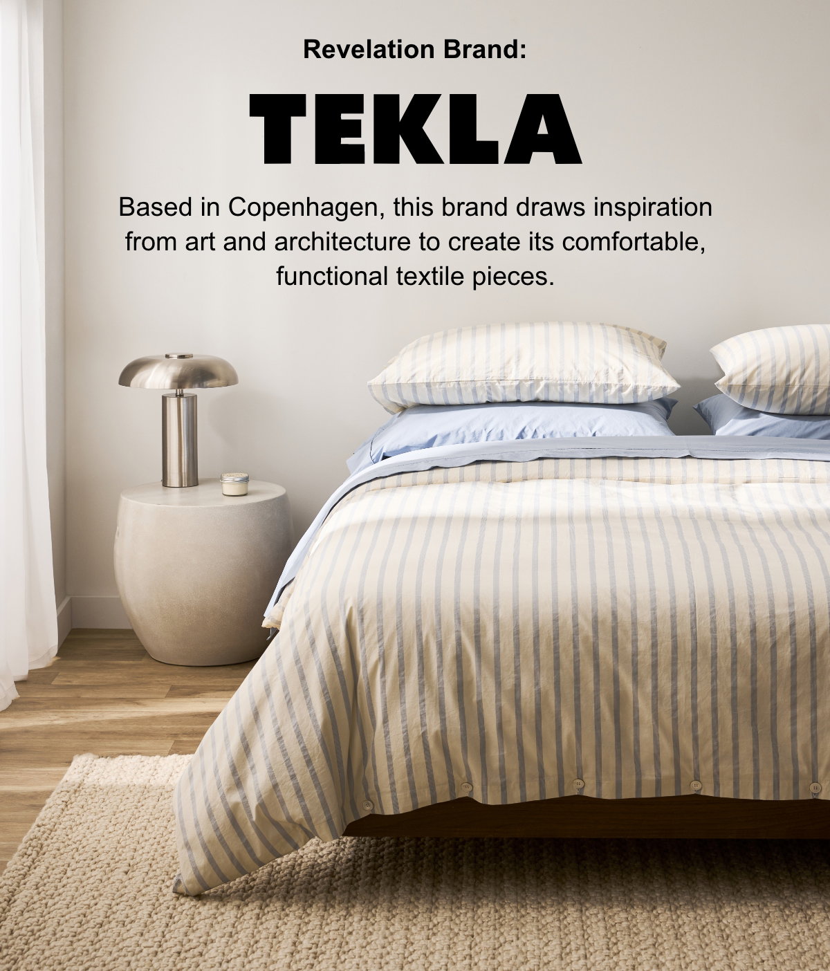 Revelation Brand : Tekla; Based in Copenhagen, this brand draws inspiration from art and architecture to create its comfortable, functional textile pieces.; Bed with a striped duvet cover and light blue sheets.