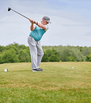 Man teeing off