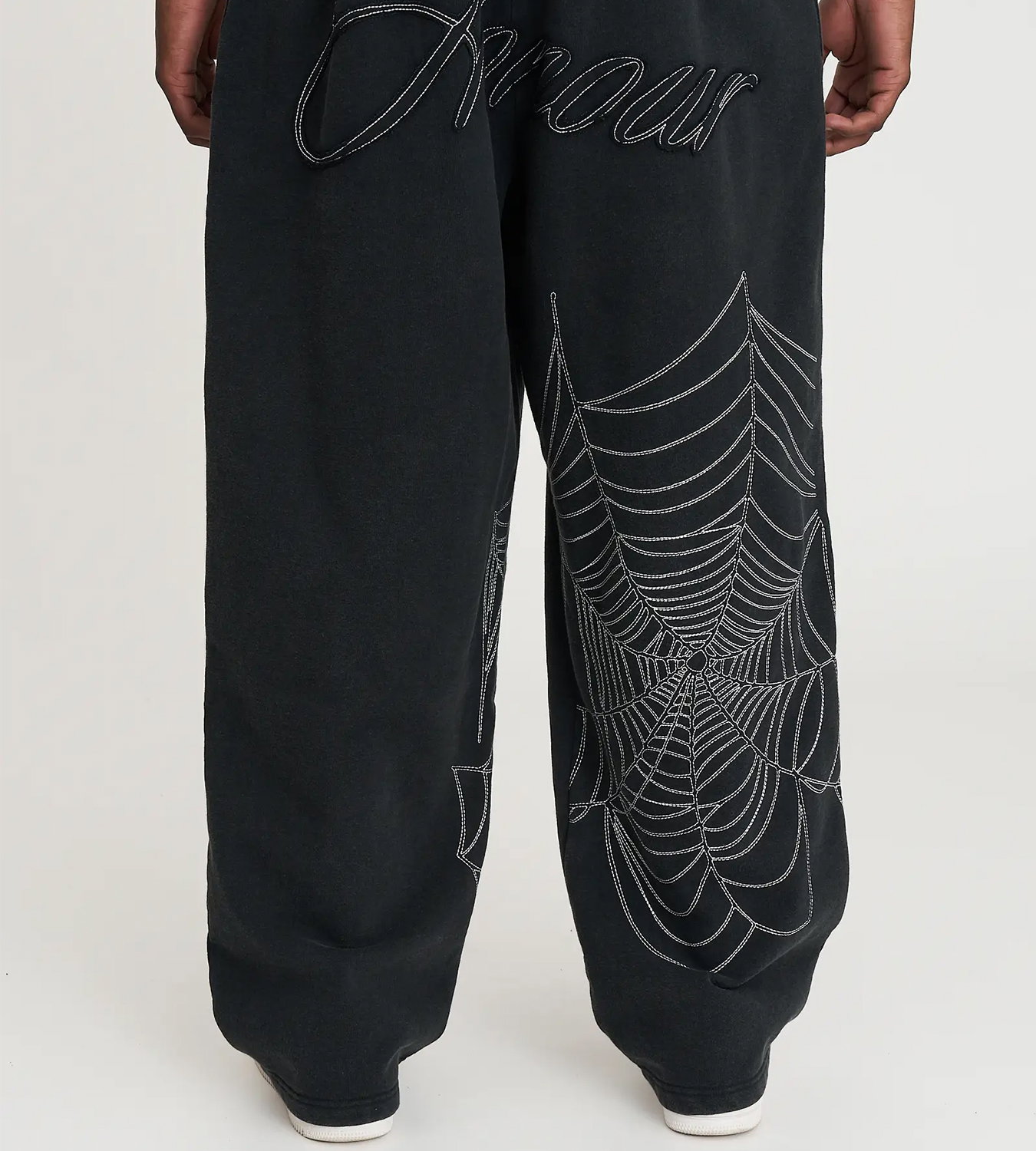 The Cobweb Wide Leg Track Pants in Black.