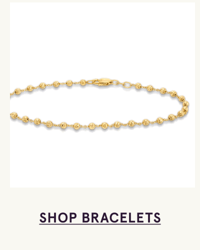 Delicate gold chain bracelet accented with small spaced gold beads. Click here to shop bracelets