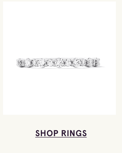 Slim eternity-style band set with row of clear stones.  Click here to shop rings