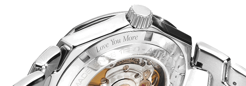 Close-up of watch engraved with ‘Love You More’