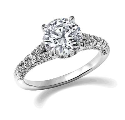 Round-cut diamond engagement ring in white gold with pavé-set diamonds on the band.