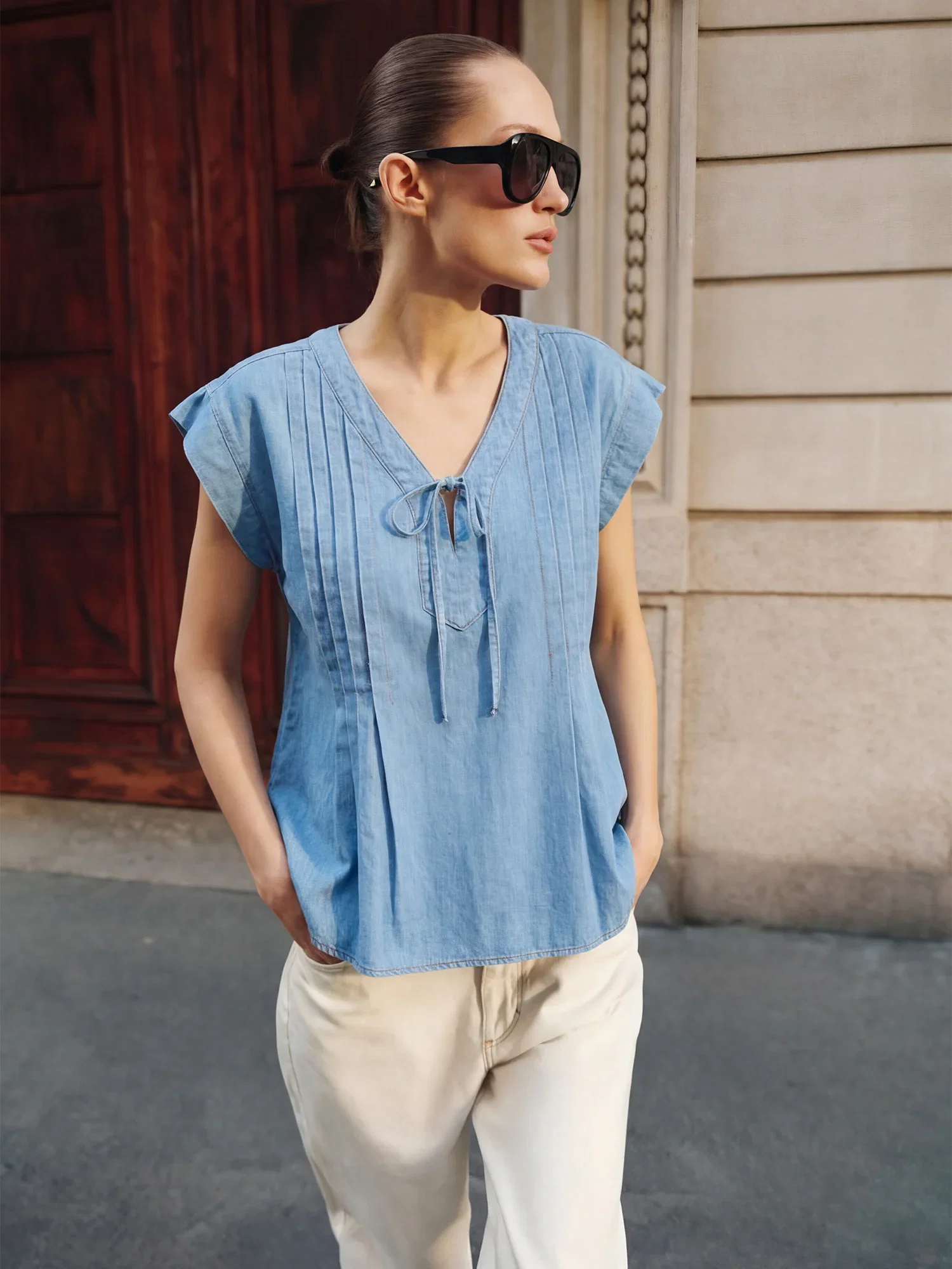 Image of Sleeveless Tie Pin Tuck Cotton Chambray Blouse