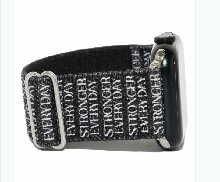 Black knit Apple Watch band with "STRONGER EVERY DAY" text and silver clasps