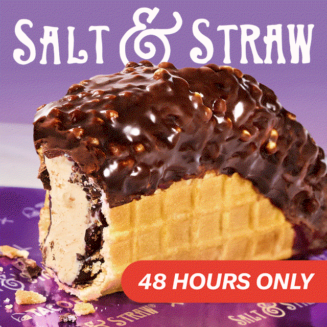 A hand holding a Taco Bell&reg X Salt & Straw Churro Ice Cream Taco.