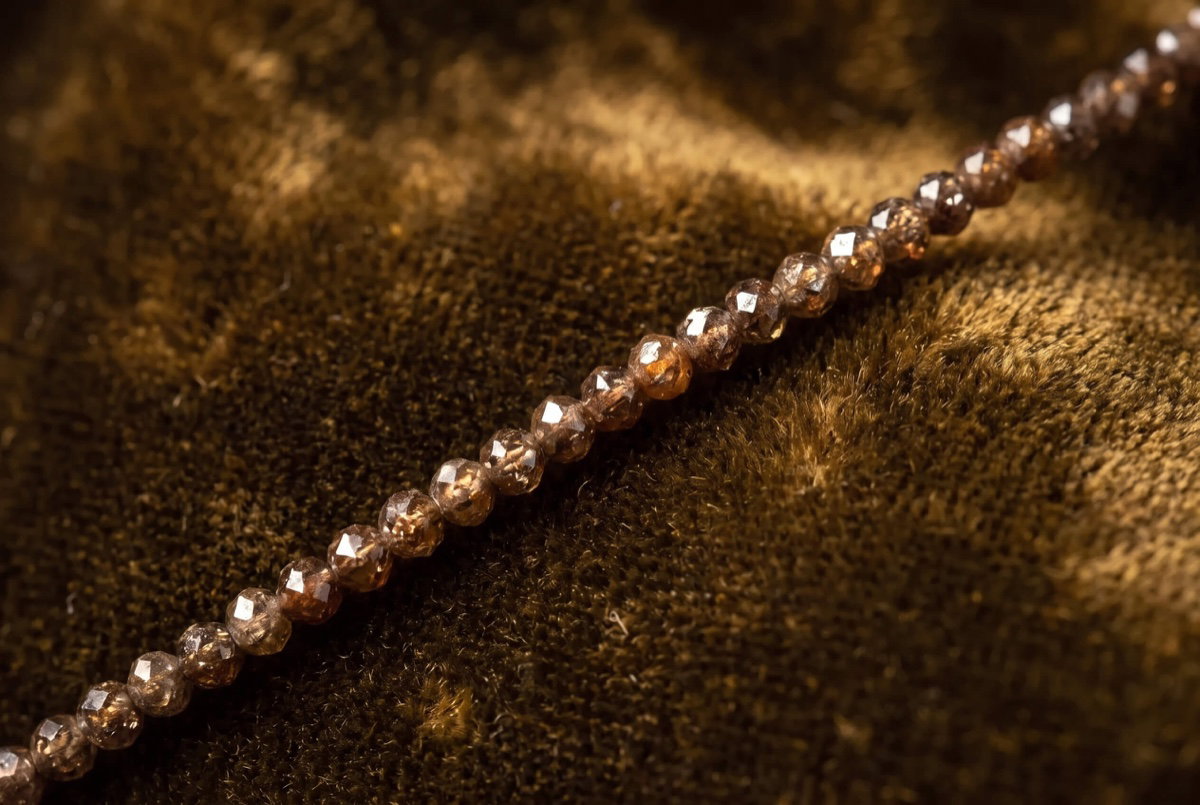 Faceted red-brown diamonds glowing in warm light