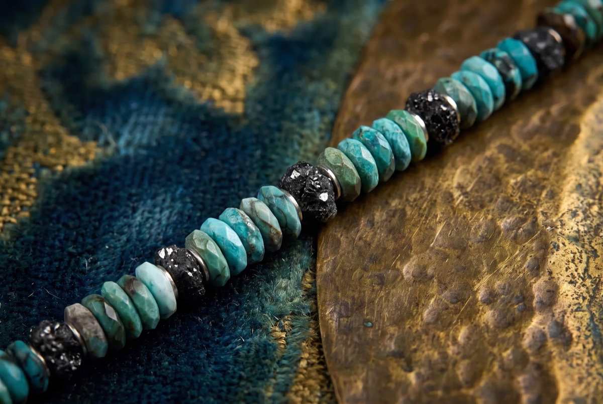 Natural turquoise contrasted with raw black diamond accents