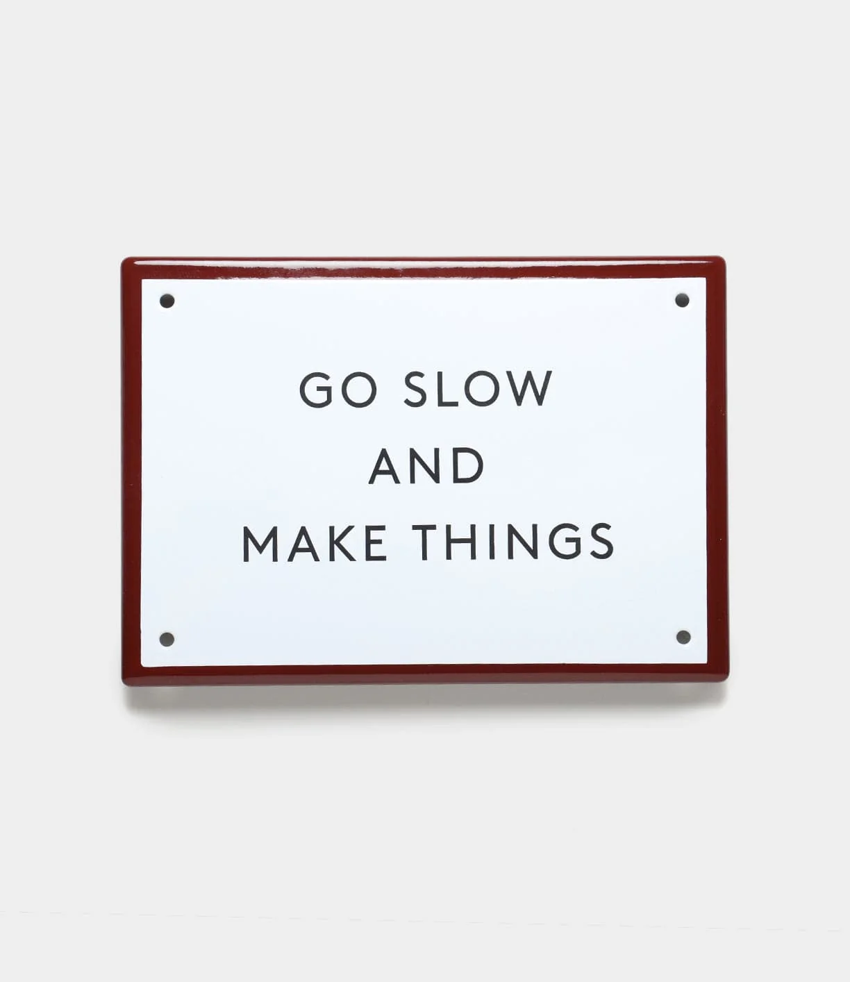 Image of “Go Slow” Enamel Steel Sign