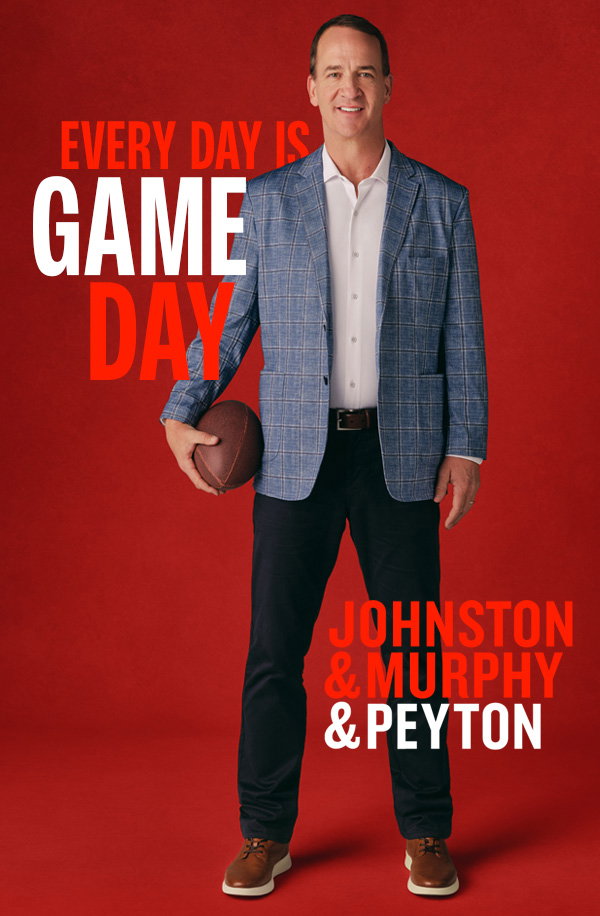 Peyton Manning holding a football while wearing a blue plaid blazer, white polo, dark pants, and brown shoes. Text reads: 