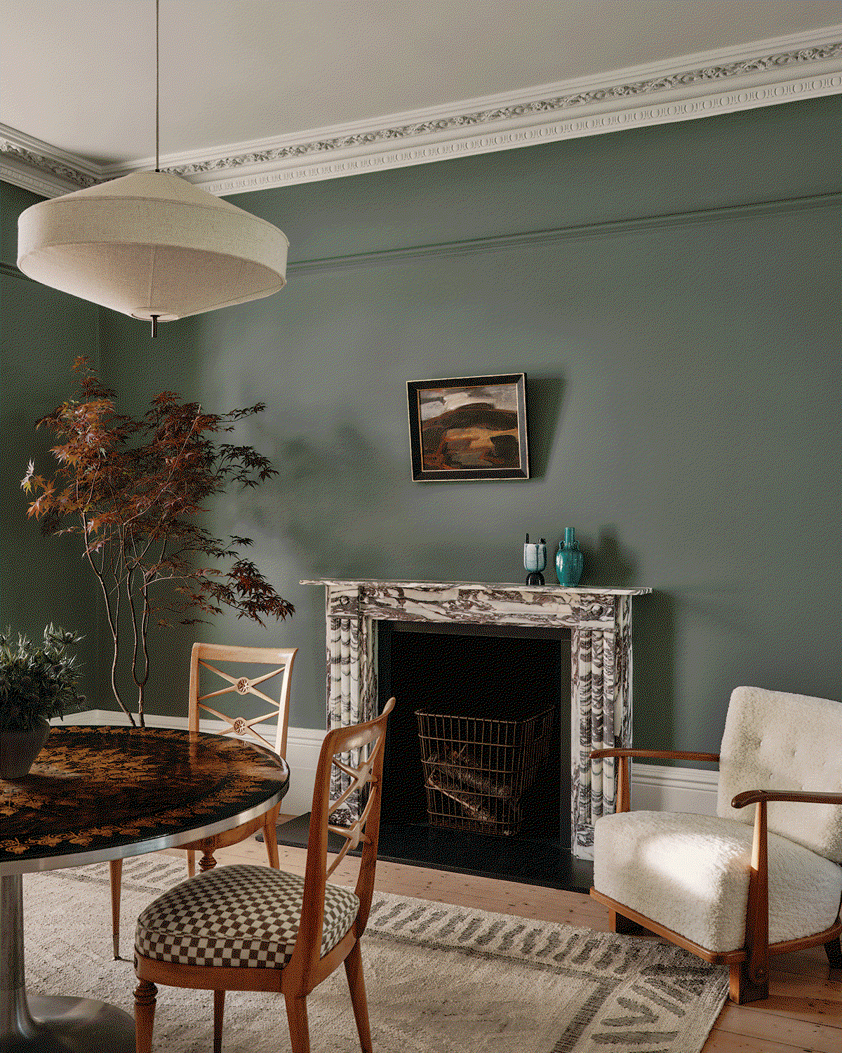 Animated sequence showing interiors painted in Farrow & Ball's Green Smoke and Pigeon colours, highlighting how different greens transform a room's atmosphere.