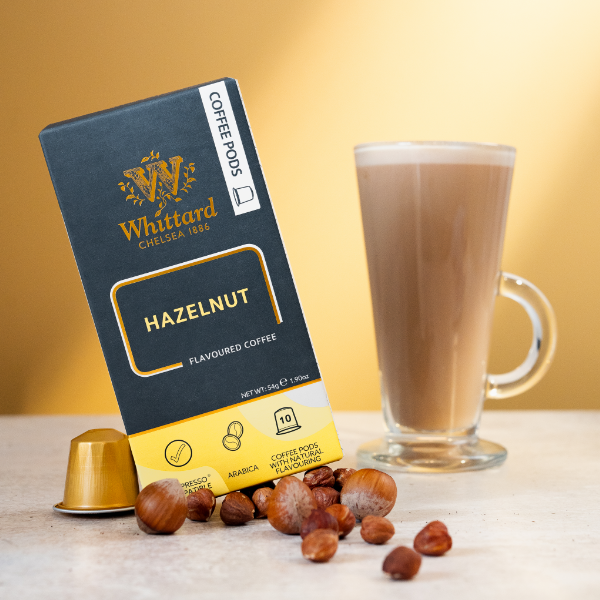 Image of hazelnut coffee pods with made up drink 