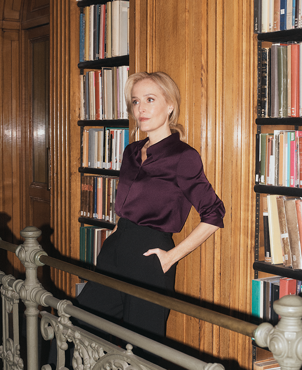 Gillian Anderson wearing Dark Aubergine Satin Collared Button Through Shirt and Black Slim Side Zip Flared Trousers