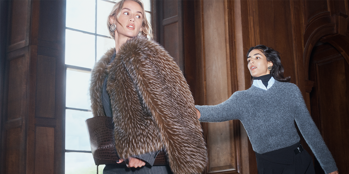Two women wearing Brown Mix Faux Fur Jacket and Mid Grey Moahair Vee Jumper