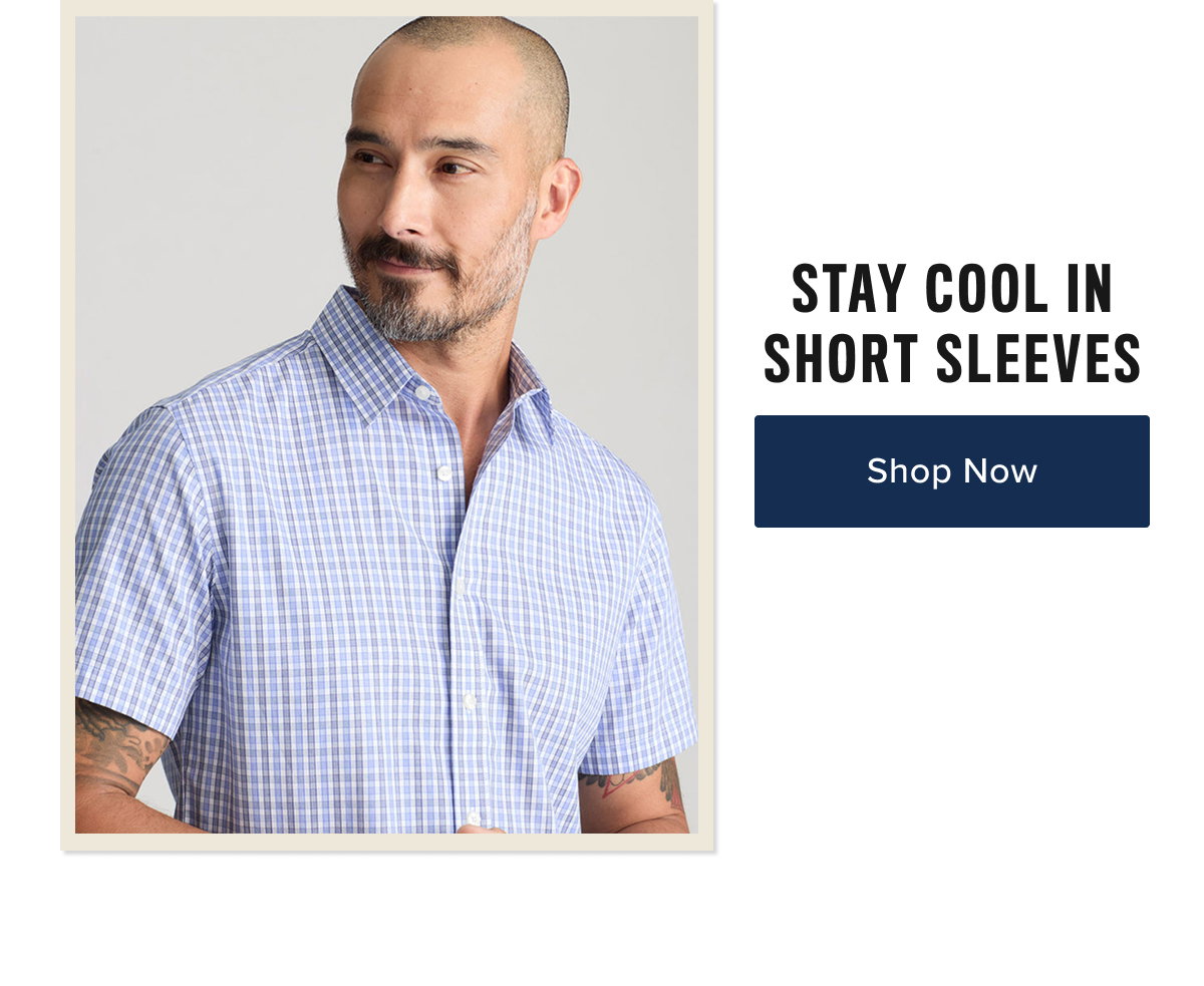 Model is wearing UNTUCKit short sleeve wrinkle-free shirt. 