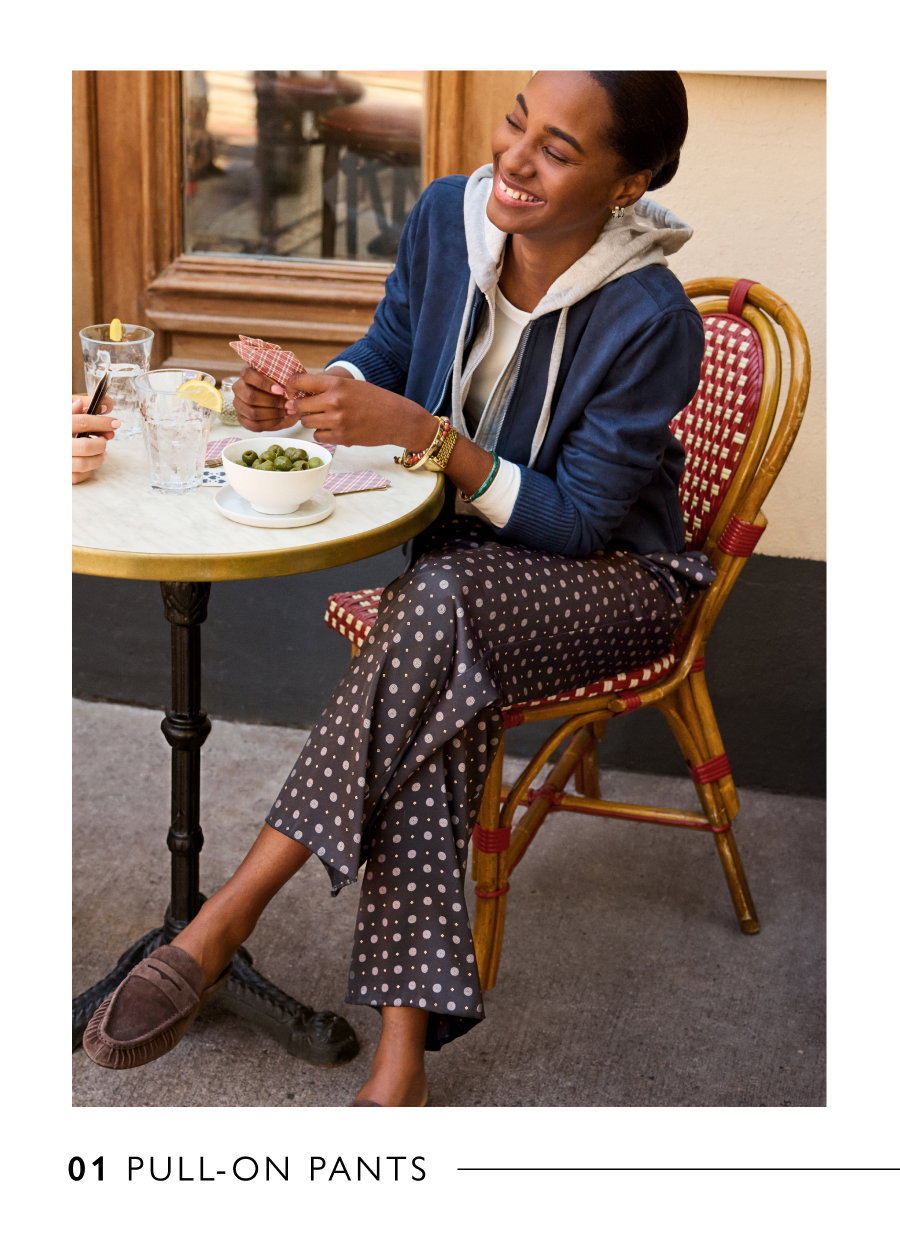 01 Image of woman at a cafe wearing Pull-on Pants