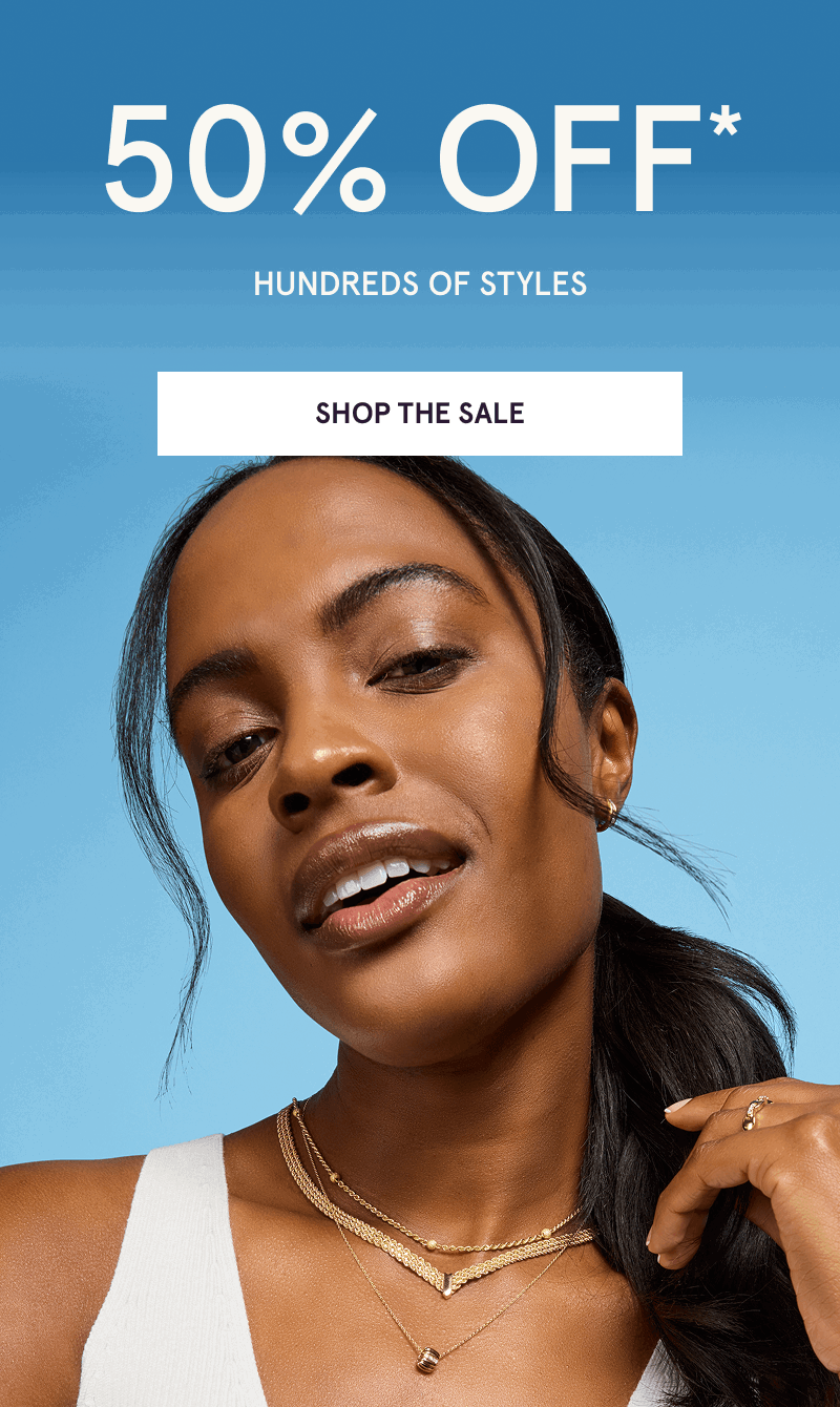 Model layered in unique & textured gold necklaces. 50% OFF 100s of styles. Click here to shop the sale