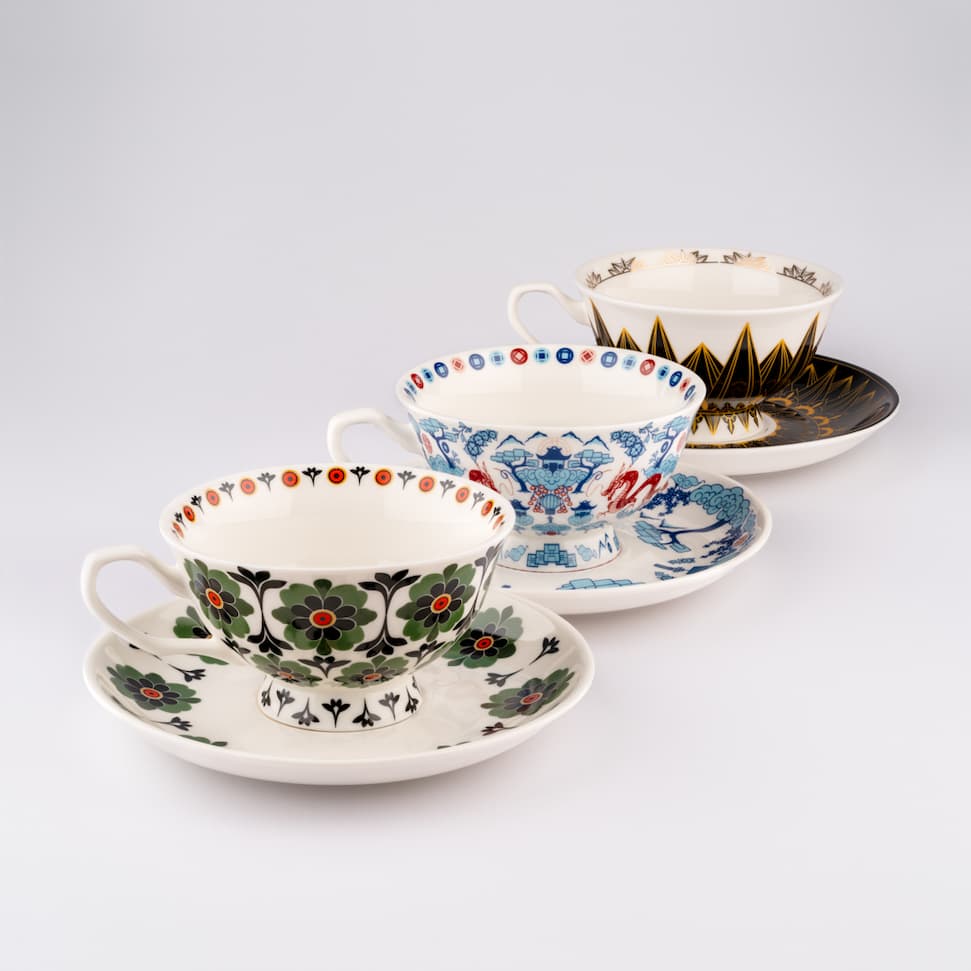 3 new cup and saucer set designs aligned (arabesque green, chinoiserie blue, art deco)