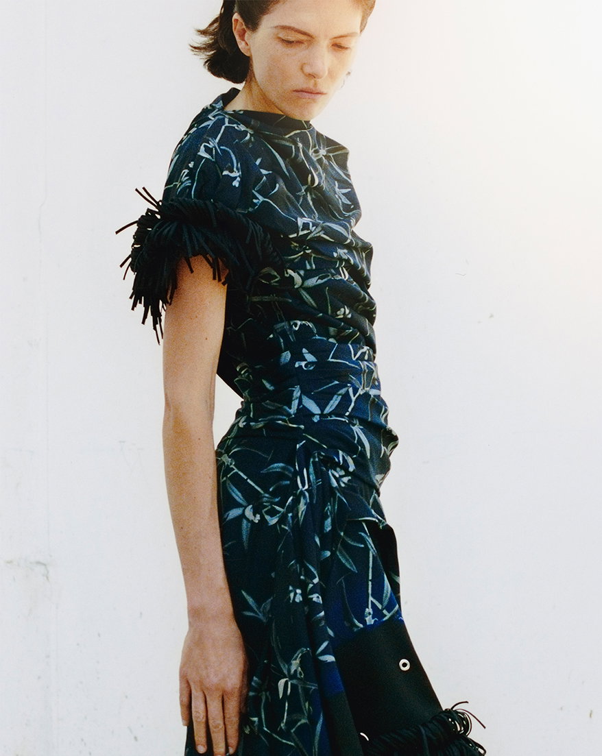 Cropped Campaign image of model wearing the Bodine Dress in Printed Stretch Cady in Ink Multi