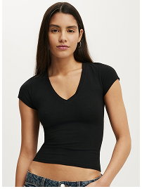 Black v-neck short sleeve crop top on model