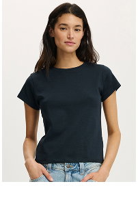 Woman wearing black short-sleeve crew neck t-shirt and jeans